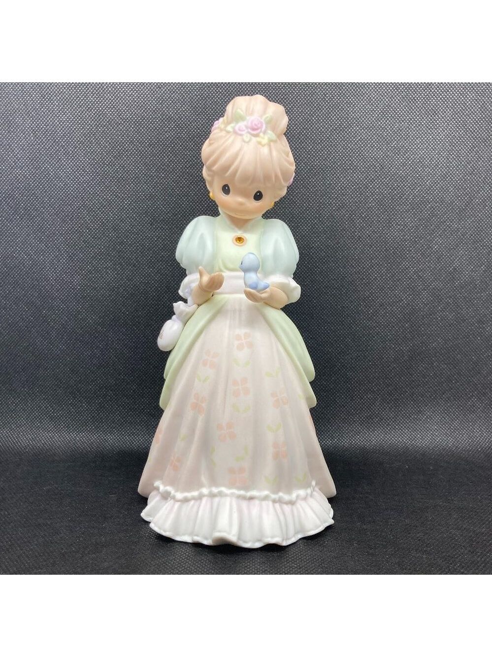 Precious Moments "Charity Begins In The Heart" figurine